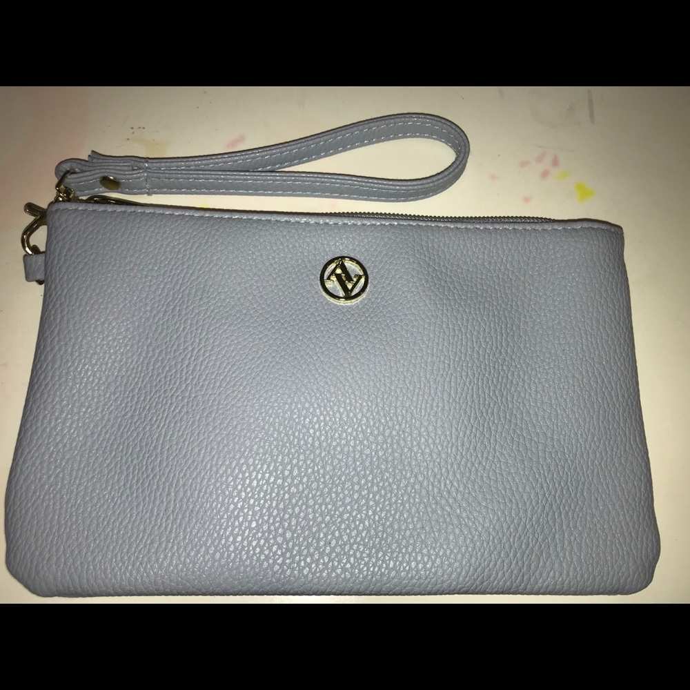 Adrienne Vittadini wristlet PHONE CHARGER.
